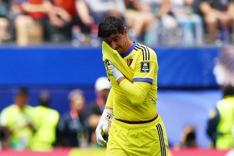 Belgium's Thibaut Courtois looks dejected after being substituted due to injury. (Image